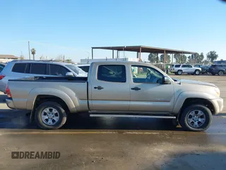 2005 Toyota Tacoma PreRunner with VIN 3TMKU72N55M003169, listed as a IAAI auction lot 41337937 with 142,474 mi miles. Bid and sale history available at carsss.com. Image 13.