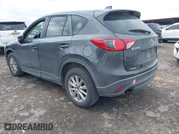 2015 Mazda CX-5 Touring with VIN JM3KE2CY2F0461935, listed as a IAAI auction lot 41430070 with 220,857 mi miles and . Bid and sale history available at DreamBid. Image 3.