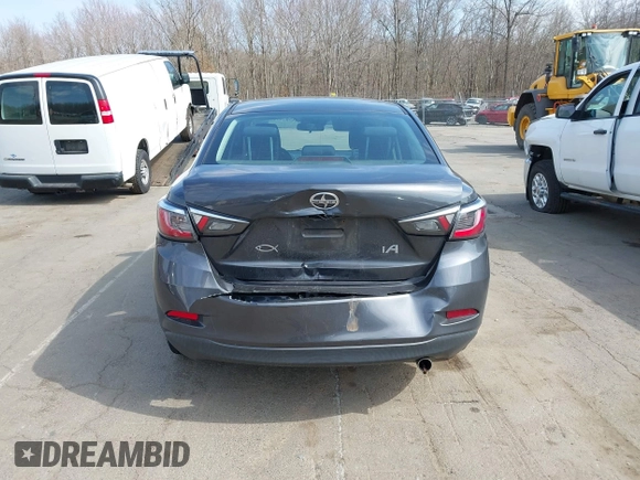 2016 Scion iA with VIN 3MYDLBZV2GY129703, listed as a IAAI auction lot 41787371 with 77,459 mi miles. Bid and sale history available at carsss.com. Image 16.