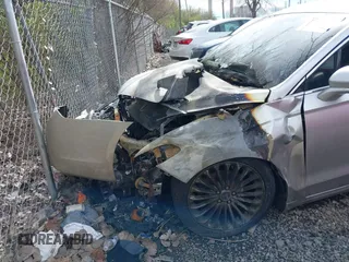 2016 Ford Fusion Titanium with VIN 3FA6P0K95GR400718, listed as a IAAI auction lot 41957913 with 133,037 mi miles. Bid and sale history available at carsss.com. Image 6.