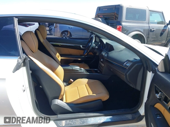 2014 Mercedes-Benz E 350 with VIN WDDKJ8JB7EF257896, listed as a IAAI auction lot 42291137 with 124,499 mi miles and . Bid and sale history available at DreamBid. Image 5.