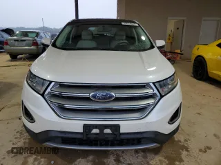 2015 Ford Edge Titanium z VIN 2FMTK4K80FBB73022, wystawiony jako Copart lot #53654035 z przebiegiem 155 848 mil mil oraz Szkoda całkowita • Salvage title. Historia ofert i sprzedaży dostępna na DreamBid. Obrazek 5.