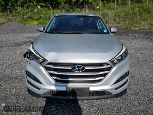 2018 Hyundai Tucson SEL with VIN KM8J3CA49JU666942, listed as a Copart auction lot 58911095 with 73,839 mi miles and Salvage title. Bid and sale history available at DreamBid. Image 5.