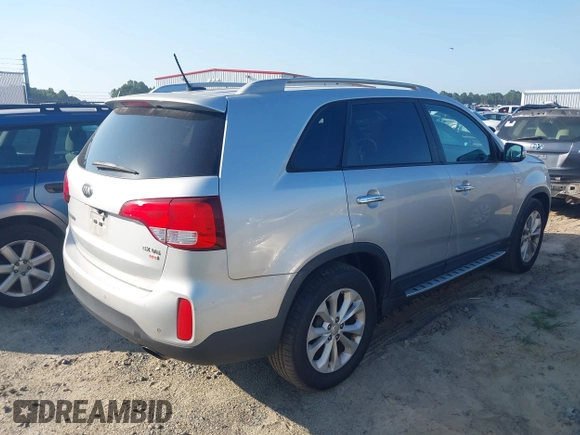 2015 Kia Sorento EX with VIN 5XYKUDA74FG562759, listed as a IAAI auction lot 42838149 with 180,571 mi miles and . Bid and sale history available at DreamBid. Image 4.