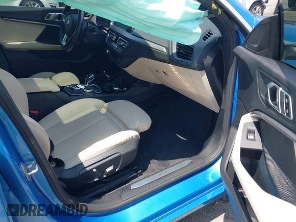 2021 BMW 2 Series 228i xDrive with VIN WBA73AK06M7G47198, listed as a IAAI auction lot 42169478 with 55,459 mi miles and . Bid and sale history available at DreamBid. Image 5.