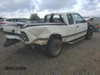 1995 Toyota T100 DX z VIN JT4VD12E5S0002399, wystawiony jako Copart lot #50703005 z przebiegiem 381 083 mil mil oraz Szkody całkowita. Historia ofert i sprzedaży dostępna na DreamBid. Obrazek 3.