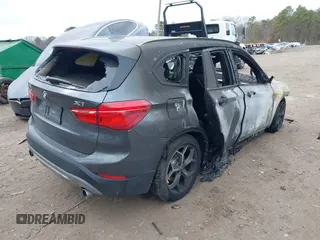 2017 BMW X1 sDrive28i with VIN WBXHU7C39H5H36722, listed as a IAAI auction lot 41724022 with 33,412 mi miles. Bid and sale history available at carsss.com. Image 4.