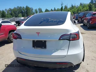 2022 Tesla Model Y Long Range z VIN 7SAYGDEE9NF509655, wystawiony jako IAAI lot #42433796 z przebiegiem 46 936 mil mil oraz . Historia ofert i sprzedaży dostępna na DreamBid. Obrazek 16.