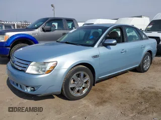 2008 Ford Taurus Limited with VIN 1FAHP28W18G122460, listed as a IAAI auction lot 41716924 with 83,523 mi miles. Bid and sale history available at carsss.com. Image 2.