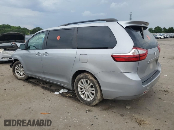 2015 Toyota Sienna XLE с VIN 5TDYK3DC1FS541180, выставлен на аукционе Copart как лот 59078585 с пробегом 94 014 миль миль и Списание • Salvage title. История ставок и продаж доступна на DreamBid. Изображение 2.