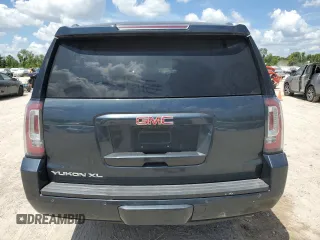 2019 GMC Yukon XL SLT with VIN 1GKS1GKCXKR404691, listed as a Copart auction lot 66746584 with 0 mi miles and Salvage Title. Bid and sale history available at carsss.com. Image 6.