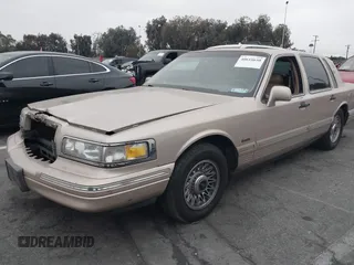 1997 Lincoln Town Car Executive with VIN 1LNLM81W6VY754706, listed as a IAAI auction lot 41375121 with 185,863 mi miles and . Bid and sale history available at DreamBid. Image 2.
