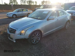 2013 Cadillac ATS Luxury with VIN 1G6AH5S37D0126611, listed as a IAAI auction lot 40982726 with 127,572 mi miles. Bid and sale history available at carsss.com. Image 2.