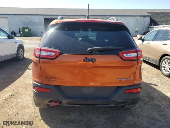 2015 Jeep Cherokee Trailhawk with VIN 1C4PJMBS0FW604168, listed as a Copart auction lot 51470625 with 186,211 mi miles and Salvage Title. Bid and sale history available at carsss.com. Image 6.