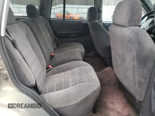 1996 Jeep Grand Cherokee Laredo with VIN 1J4FX58S5TC248122, listed as a Copart auction lot 45843935 with 295,521 mi miles and Salvage Title. Bid and sale history available at carsss.com. Image 10.