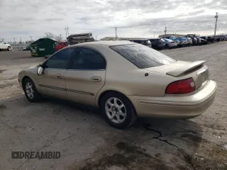 2000 Mercury Sable LS Premium z VIN 1MEFM55S0YA621927, wystawiony jako Copart lot #87052444 z przebiegiem 34 930 mil mil oraz Szkoda całkowita • Salvage title. Historia ofert i sprzedaży dostępna na DreamBid. Obrazek 2.