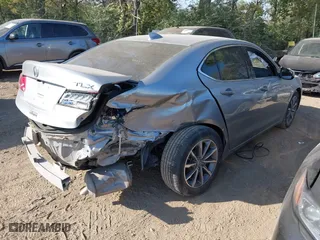 2019 Acura TLX with VIN 19UUB1F3XKA009385, listed as a IAAI auction lot 40584274 with 61,376 mi miles. Bid and sale history available at carsss.com. Image 4.