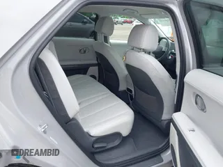 2022 Hyundai Ioniq 5 SEL z VIN KM8KNDAF0NU055189, wystawiony jako IAAI lot #42390538 z przebiegiem 37 542 mil mil oraz . Historia ofert i sprzedaży dostępna na DreamBid. Obrazek 8.