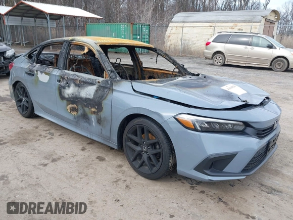 2022 Honda Civic Sport with VIN 2HGFE2F5XNH553141, listed as a IAAI auction lot 41610028 with Not Provided miles and . Bid and sale history available at DreamBid. Image 1.