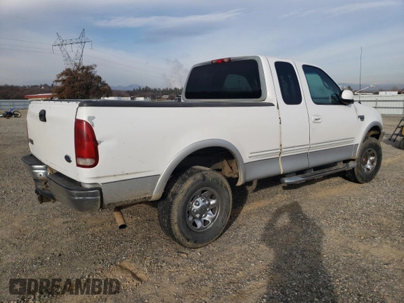 1998 Ford F-250 with VIN 1FTPX28L4WKA41149, listed as a Copart auction lot 84369654 with 430,187 mi miles and Salvage title. Bid and sale history available at DreamBid. Image 3.