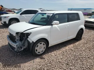 2014 Scion xB with VIN JTLZE4FE1EJ062614, listed as a Copart auction lot 50969405 with 129,595 mi miles and Salvage Title. Bid and sale history available at carsss.com. Image 1.