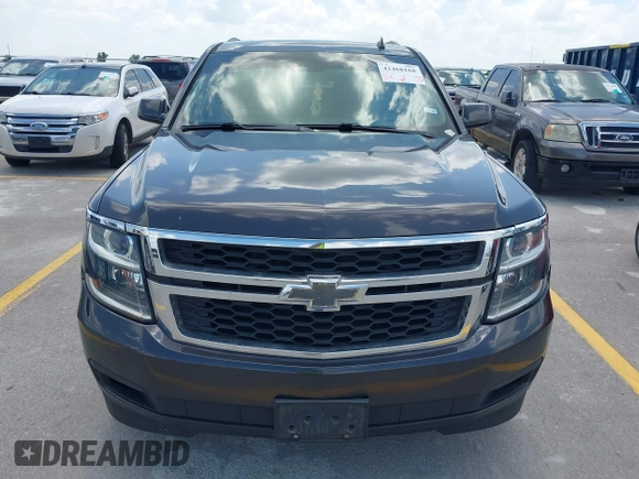 2015 Chevrolet Suburban LT z VIN 1GNSKJKC9FR245097, wystawiony jako IAAI lot #42468168 z przebiegiem 198 454 mil mil oraz . Historia ofert i sprzedaży dostępna na DreamBid. Obrazek 12.