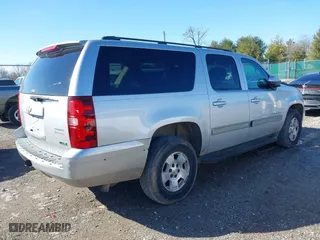 2010 Chevrolet Suburban LS with VIN 1GNUKHE31AR165699, listed as a IAAI auction lot 41509508 with 260,762 mi miles. Bid and sale history available at carsss.com. Image 4.