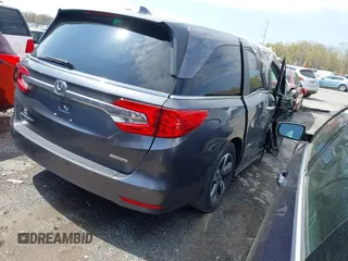 2018 Honda Odyssey Touring with VIN 5FNRL6H8XJB029570, listed as a IAAI auction lot 41485794 with 77,601 mi miles. Bid and sale history available at carsss.com. Image 4.