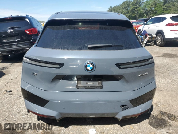 2022 BMW iX xDrive50 с VIN WB523CF00NCK44547, выставлен на аукционе Copart как лот 55262775 с пробегом 22 664 миль миль и Списание • Salvage title. История ставок и продаж доступна на DreamBid. Изображение 6.
