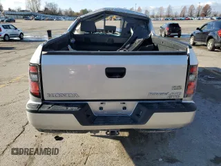 2012 Honda Ridgeline Sport z VIN 5FPYK1F75CB453602, wystawiony jako Copart lot #85459634 z przebiegiem Nie podano mil oraz Szkoda całkowita • Salvage title. Historia ofert i sprzedaży dostępna na DreamBid. Obrazek 6.