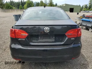 2014 Volkswagen Jetta SEL with VIN 3VWL17AJ2EM440524, listed as a Copart auction lot 61206685 with 104,987 mi miles and Salvage title. Bid and sale history available at DreamBid. Image 6.