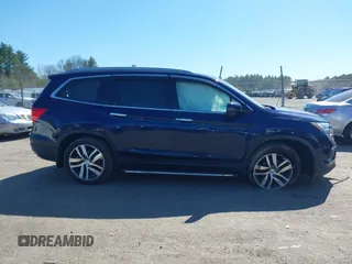 2017 Honda Pilot Touring with VIN 5FNYF6H98HB020341, listed as a IAAI auction lot 42037156 with 73,511 mi miles and . Bid and sale history available at DreamBid. Image 13.