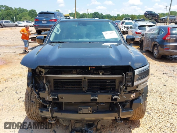 2024 Nissan Frontier Pro-4X with VIN 1N6ED1EK3RN604083, listed as a IAAI auction lot 42479714 with 5,187 mi miles and . Bid and sale history available at DreamBid. Image 12.