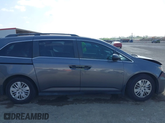 2015 Honda Odyssey LX with VIN 5FNRL5H29FB032327, listed as a IAAI auction lot 42052043 with 153,365 mi miles and . Bid and sale history available at DreamBid. Image 13.