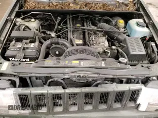 1995 Jeep Grand Cherokee Limited z VIN 1J4GZ78S9SC547492, wystawiony jako Copart lot #83001084 z przebiegiem 109 863 mil mil oraz Czysty tytuł • Clean title. Historia ofert i sprzedaży dostępna na DreamBid. Obrazek 14.