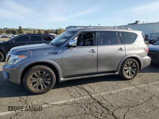 2017 Nissan Armada Platinum z VIN JN8AY2NF1H9300454, wystawiony jako Copart lot #49198605 z przebiegiem 109 546 mil mil oraz Szkoda całkowita • Salvage title. Historia ofert i sprzedaży dostępna na DreamBid. Obrazek 1.