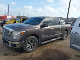 2018 Nissan Titan SV with VIN 1N6AA1E64JN502421, listed as a IAAI auction lot 40735048 with 71,256 mi miles and . Bid and sale history available at DreamBid. Image 14.
