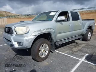 2012 Toyota Tacoma PreRunner with VIN 3TMKU4HN6CM033123, listed as a IAAI auction lot 41478582 with 89,479 mi miles and . Bid and sale history available at DreamBid. Image 2.