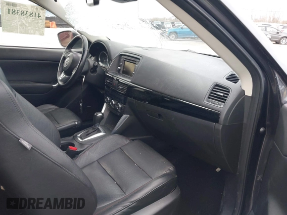 2015 Mazda CX-5 Grand Touring with VIN JM3KE4DY0F0479229, listed as a IAAI auction lot 41838381 with 139,843 mi miles. Bid and sale history available at carsss.com. Image 5.