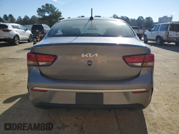 2023 Kia Rio LX with VIN 3KPA24AD6PE572943, listed as a Copart auction lot 48073475 with 34,677 mi miles and Salvage Title. Bid and sale history available at DreamBid. Image 6.