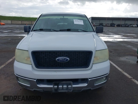 2004 Ford F-150 STX with VIN 1FTRX12W84NC29545, listed as a IAAI auction lot 41921712 with 304,891 mi miles. Bid and sale history available at carsss.com. Image 12.
