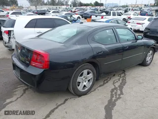 2006 Dodge Charger with VIN 2B3KA43G56H182676, listed as a IAAI auction lot 42052425 with 301,664 mi miles. Bid and sale history available at carsss.com. Image 4.