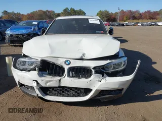 2018 BMW 3 Series 330i xDrive with VIN WBA8D9G55JNU67347, listed as a IAAI auction lot 40597140 with 68,557 mi miles. Bid and sale history available at carsss.com. Image 12.
