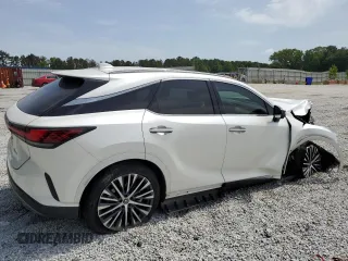 2023 Lexus RX 350 with VIN JTJCHMAA9P2005987, listed as a Copart auction lot 57335515 with 27,538 mi miles and Salvage title. Bid and sale history available at DreamBid. Image 3.