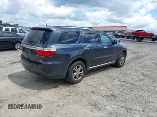 2013 Dodge Durango Crew with VIN 1C4RDHDG7DC657898, listed as a IAAI auction lot 42522353 with 234,483 mi miles and . Bid and sale history available at DreamBid. Image 4.