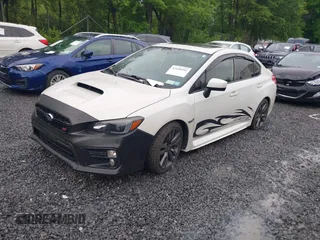 2015 Subaru WRX Premium with VIN JF1VA1D66F9819998, listed as a IAAI auction lot 42458202 with 196,109 mi miles and . Bid and sale history available at DreamBid. Image 2.