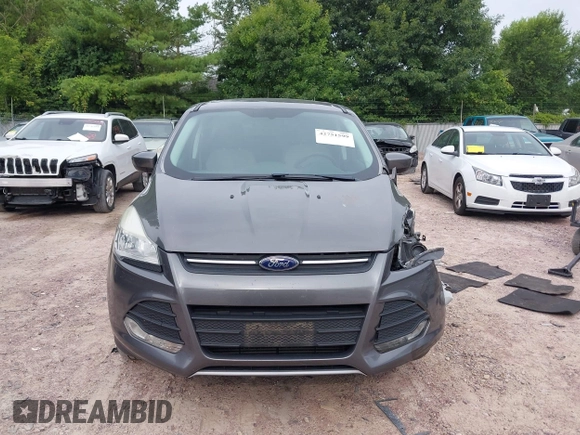 2013 Ford Escape SE with VIN 1FMCU0G96DUC26799, listed as a IAAI auction lot 42751599 with 116,312 mi miles and . Bid and sale history available at DreamBid. Image 13.