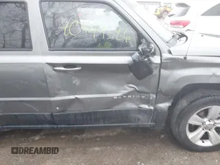 2013 Jeep Patriot Latitude with VIN 1C4NJPFB8DD129848, listed as a IAAI auction lot 40949386 with 168,839 mi miles and . Bid and sale history available at carsss.com. Image 6.