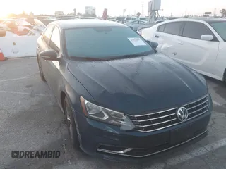 2018 Volkswagen Passat 2.0T S with VIN 1VWAA7A39JC046345, listed as a IAAI auction lot 41932857 with 117,272 mi miles. Bid and sale history available at carsss.com. Image 1.