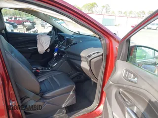 2014 Ford Escape Titanium with VIN 1FMCU0JX7EUB96463, listed as a IAAI auction lot 41935190 with 67,098 mi miles. Bid and sale history available at carsss.com. Image 5.